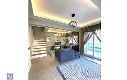 ALAÇATI'DA MÜSTAKİL HAVUZLU VE BAHÇELİ MODERN SATILIK 4+1 VİLLA