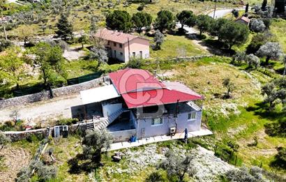 TORBALI ORMANKÖY'DE İÇİNDE 200 m2 EV OLAN SATILIK 7 DÖNÜM TARLA