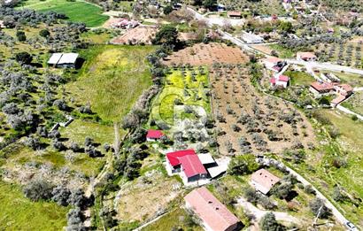 TORBALI ORMANKÖY'DE İÇİNDE 200 m2 EV OLAN SATILIK 7 DÖNÜM TARLA