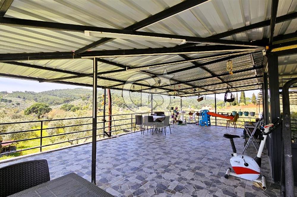 TORBALI ORMANKÖY'DE İÇİNDE 200 m2 EV OLAN SATILIK 7 DÖNÜM TARLA