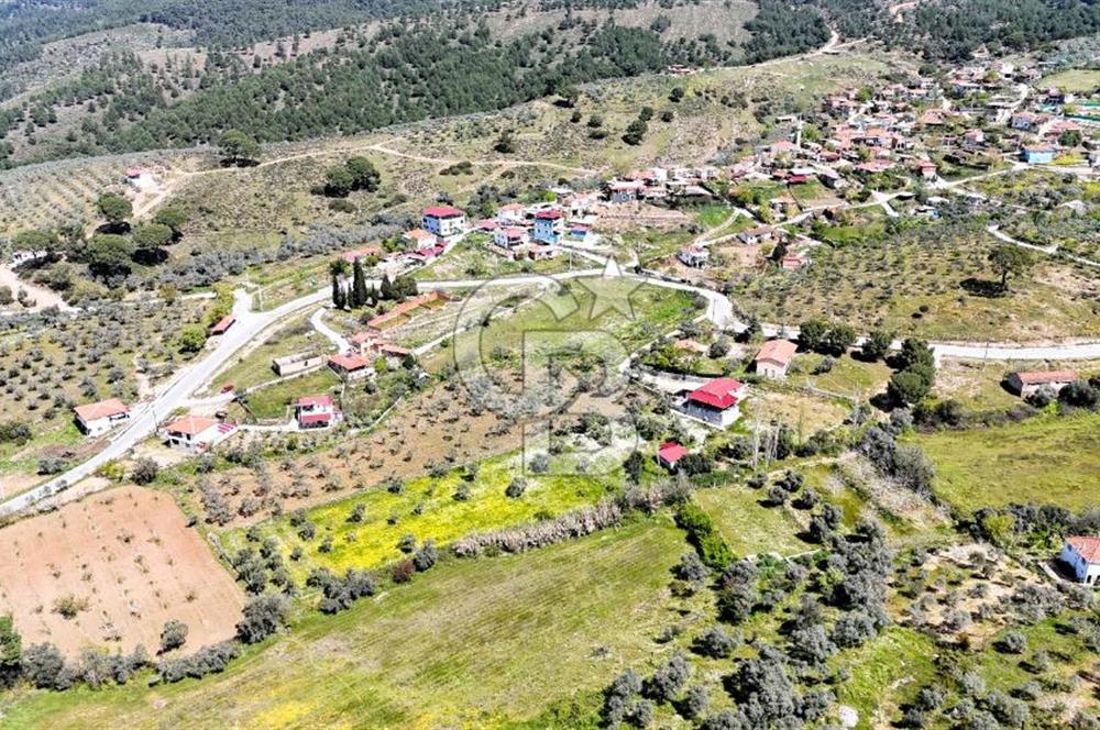 TORBALI ORMANKÖY'DE İÇİNDE 200 m2 EV OLAN SATILIK 7 DÖNÜM TARLA