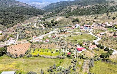 TORBALI ORMANKÖY'DE İÇİNDE 200 m2 EV OLAN SATILIK 7 DÖNÜM TARLA