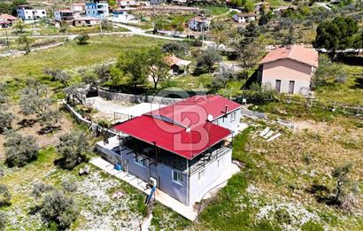TORBALI ORMANKÖY'DE İÇİNDE 200 m2 EV OLAN SATILIK 7 DÖNÜM TARLA