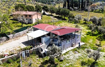 TORBALI ORMANKÖY'DE İÇİNDE 200 m2 EV OLAN SATILIK 7 DÖNÜM TARLA