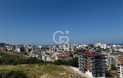 Büyükoyumca’da Deniz Manzaralı Satılık Lüks 1+1 Daire