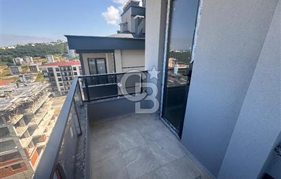 Büyükoyumca’da Deniz Manzaralı Satılık Lüks 1+1 Daire