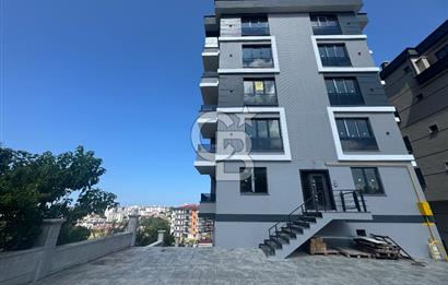 Büyükoyumca’da Deniz Manzaralı Satılık Lüks 1+1 Daire