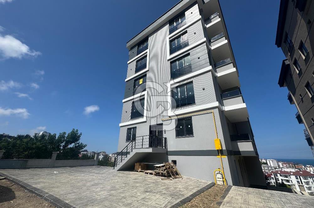 Büyükoyumca’da Deniz Manzaralı Satılık Lüks 1+1 Daire
