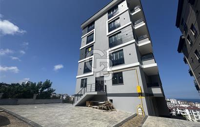 Büyükoyumca’da Deniz Manzaralı Satılık Lüks 1+1 Daire