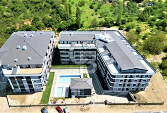 AKÇAY ALTINKUM BAHÇELİEVLER SİTESİNDE SATILIK EŞYALI 1+1 DAİRE