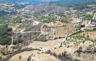 Bornova Sarnıç Köy’de Satılık 8.670 m2 Tarla