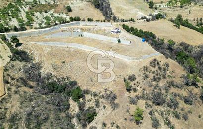 Bornova Sarnıç Köy’de Satılık 8.670 m2 Tarla