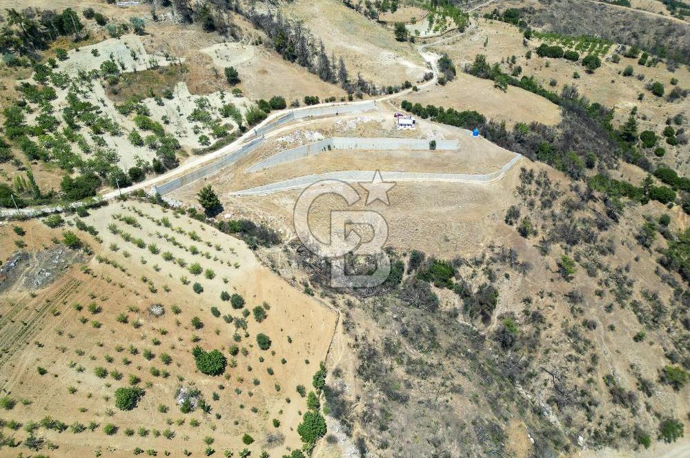 Bornova Sarnıç Köy’de Satılık 8.670 m2 Tarla