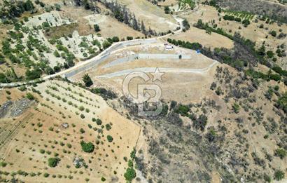 Bornova Sarnıç Köy’de Satılık 8.670 m2 Tarla