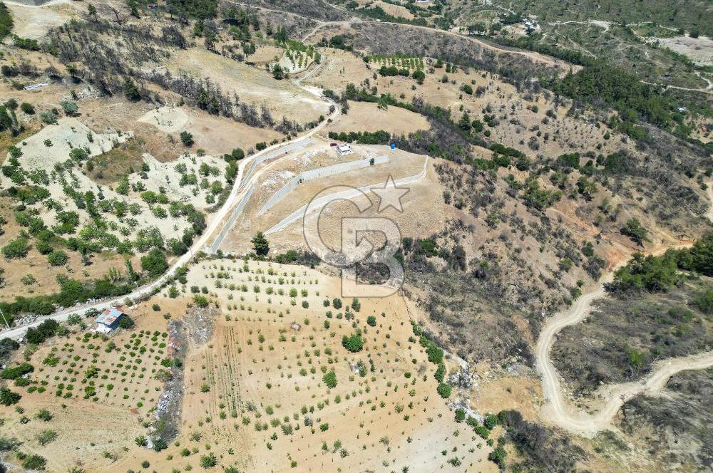 Bornova Sarnıç Köy’de Satılık 8.670 m2 Tarla