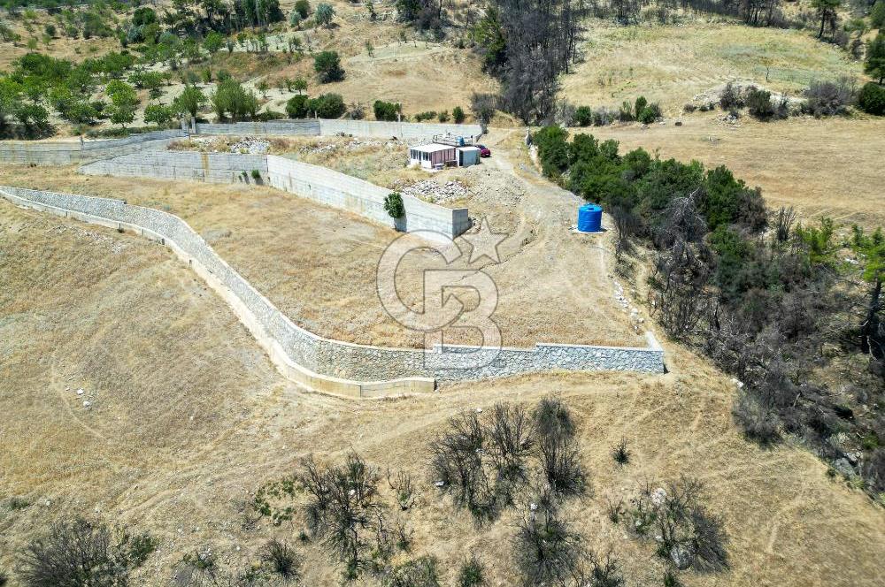 Bornova Sarnıç Köy’de Satılık 8.670 m2 Tarla