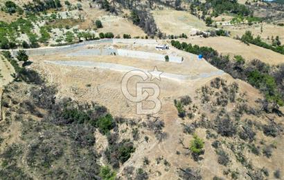 Bornova Sarnıç Köy’de Satılık 8.670 m2 Tarla