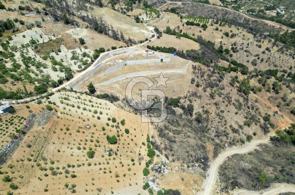 Bornova Sarnıç Köy’de Satılık 8.670 m2 Tarla