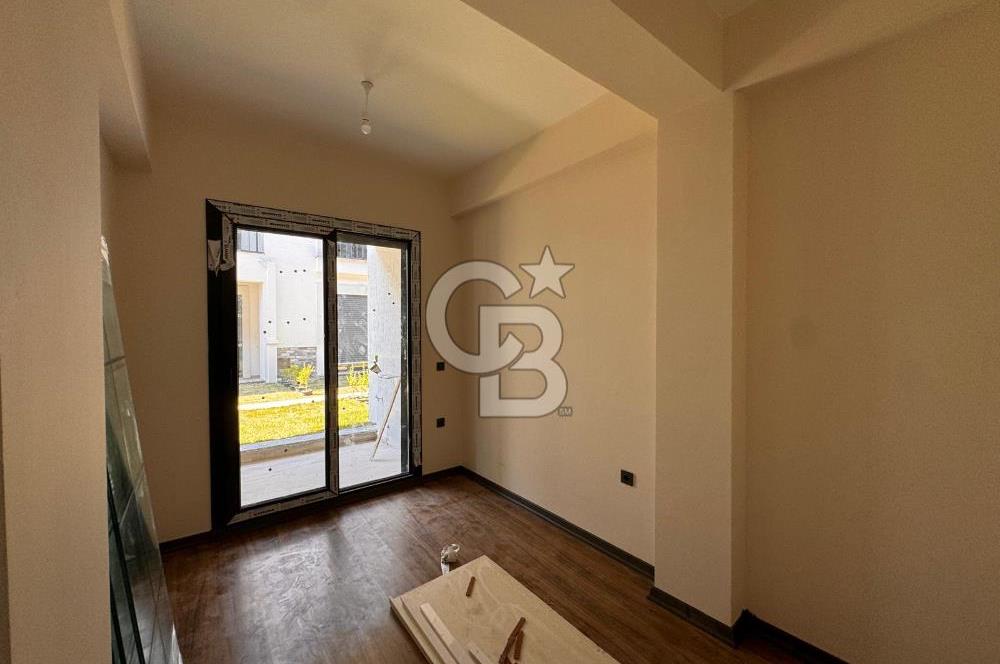 GÜRE ÇAMLIBELDE BAHÇE KULLANIMLI HAVUZLU SATILIK 1+1 DAİRE