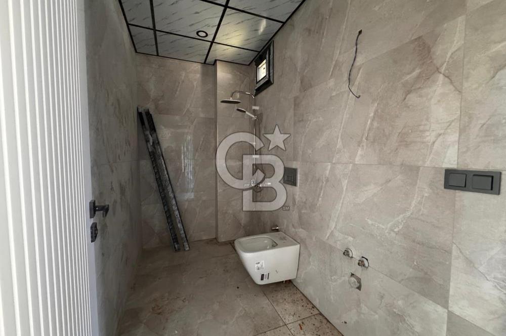 GÜRE ÇAMLIBELDE BAHÇE KULLANIMLI HAVUZLU SATILIK 1+1 DAİRE