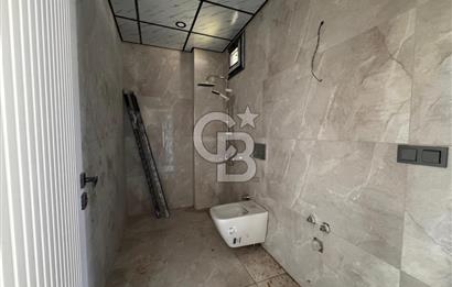 GÜRE ÇAMLIBELDE BAHÇE KULLANIMLI HAVUZLU SATILIK 1+1 DAİRE