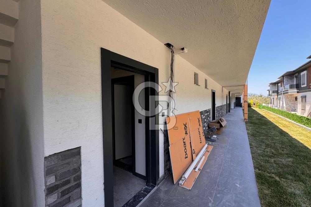GÜRE ÇAMLIBELDE BAHÇE KULLANIMLI HAVUZLU SATILIK 1+1 DAİRE