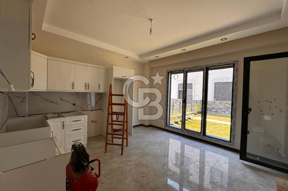 GÜRE ÇAMLIBELDE BAHÇE KULLANIMLI HAVUZLU SATILIK 1+1 DAİRE