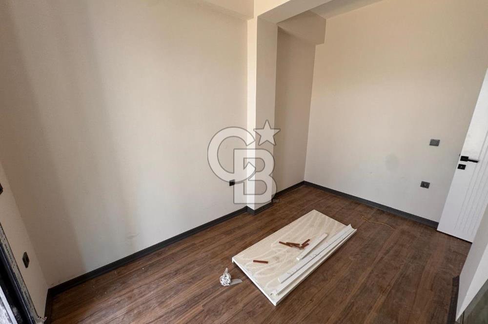 GÜRE ÇAMLIBELDE BAHÇE KULLANIMLI HAVUZLU SATILIK 1+1 DAİRE