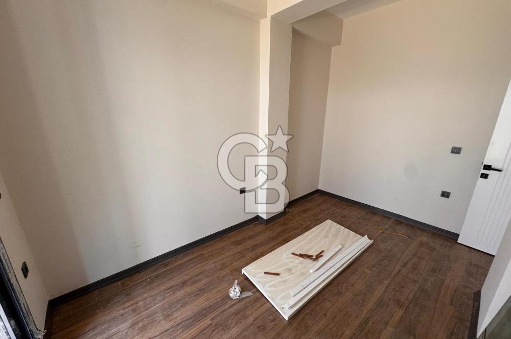 GÜRE ÇAMLIBELDE BAHÇE KULLANIMLI HAVUZLU SATILIK 1+1 DAİRE