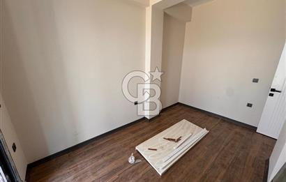 GÜRE ÇAMLIBELDE BAHÇE KULLANIMLI HAVUZLU SATILIK 1+1 DAİRE