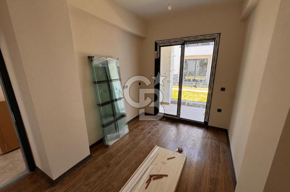 GÜRE ÇAMLIBELDE BAHÇE KULLANIMLI HAVUZLU SATILIK 1+1 DAİRE