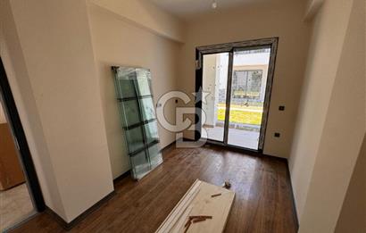 GÜRE ÇAMLIBELDE BAHÇE KULLANIMLI HAVUZLU SATILIK 1+1 DAİRE