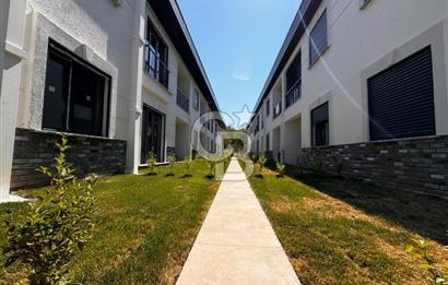 GÜRE ÇAMLIBELDE BAHÇE KULLANIMLI HAVUZLU SATILIK 1+1 DAİRE