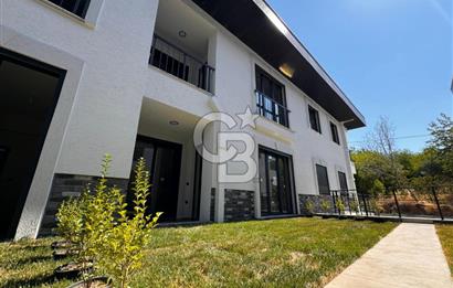 GÜRE ÇAMLIBELDE BAHÇE KULLANIMLI HAVUZLU SATILIK 1+1 DAİRE