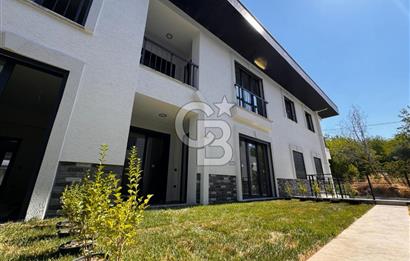 GÜRE ÇAMLIBELDE BAHÇE KULLANIMLI HAVUZLU SATILIK 1+1 DAİRE