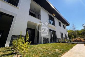 GÜRE ÇAMLIBELDE BAHÇE KULLANIMLI HAVUZLU SATILIK 1+1 DAİRE
