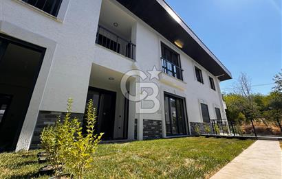 GÜRE ÇAMLIBELDE BAHÇE KULLANIMLI HAVUZLU SATILIK 1+1 DAİRE