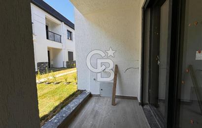GÜRE ÇAMLIBELDE BAHÇE KULLANIMLI HAVUZLU SATILIK 1+1 DAİRE