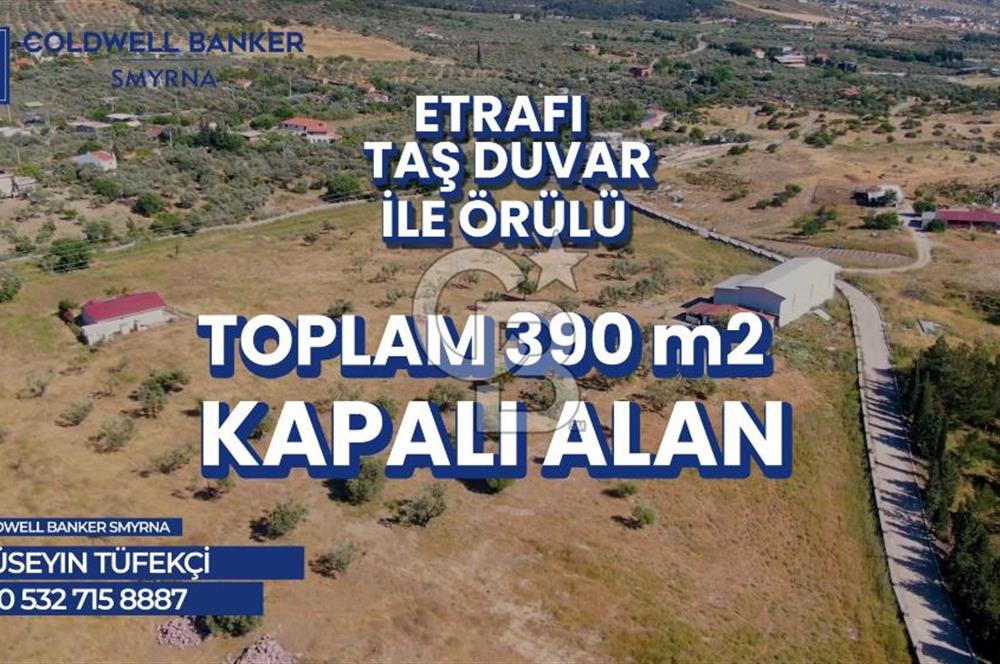 İZMİR FOÇA YENİKÖY' DE   ETRAFI TAŞ DUVAR ÖRÜLÜ SATILIK 39.000m2 TARLA