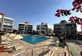 İZMİR, BAYRAKLI OSMANGAZİ HAVUZLU SİTEDE EŞYALI KİRALIK 2+1 DAİRE