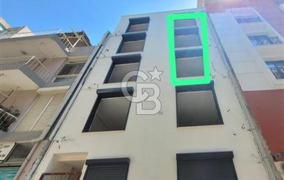 Karşıyaka Donanmacı Mahallesinde Minibüs Durakları Karşıyaka Çarşıya 2dk Mesafede Satılık Sıfır 1+1