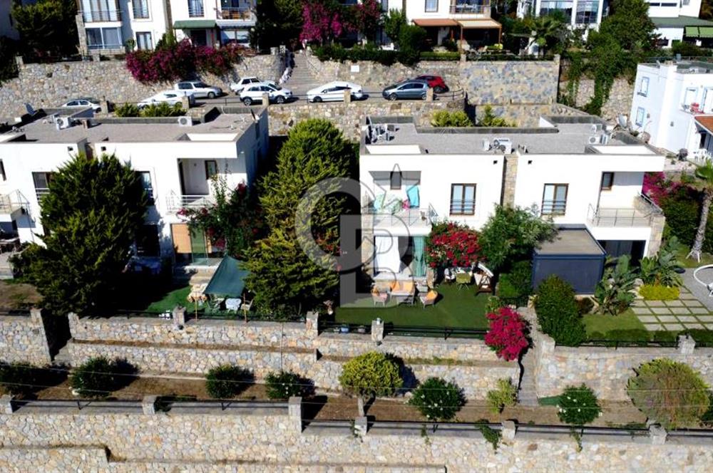 Gümüşlük Koyunbaba’da Deniz Manzaralı Bahçe Katı; Satılık Daire