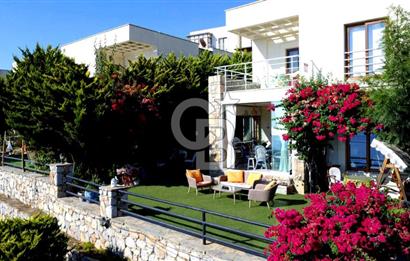 Gümüşlük Koyunbaba’da Deniz Manzaralı Bahçe Katı; Satılık Daire
