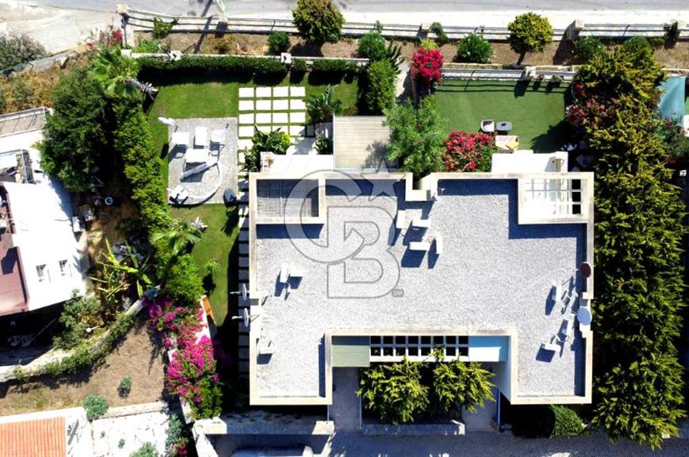 Gümüşlük Koyunbaba’da Deniz Manzaralı Bahçe Katı; Satılık Daire