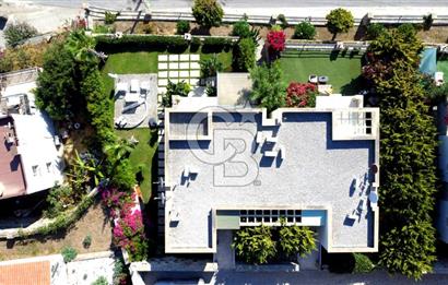 Gümüşlük Koyunbaba’da Deniz Manzaralı Bahçe Katı; Satılık Daire