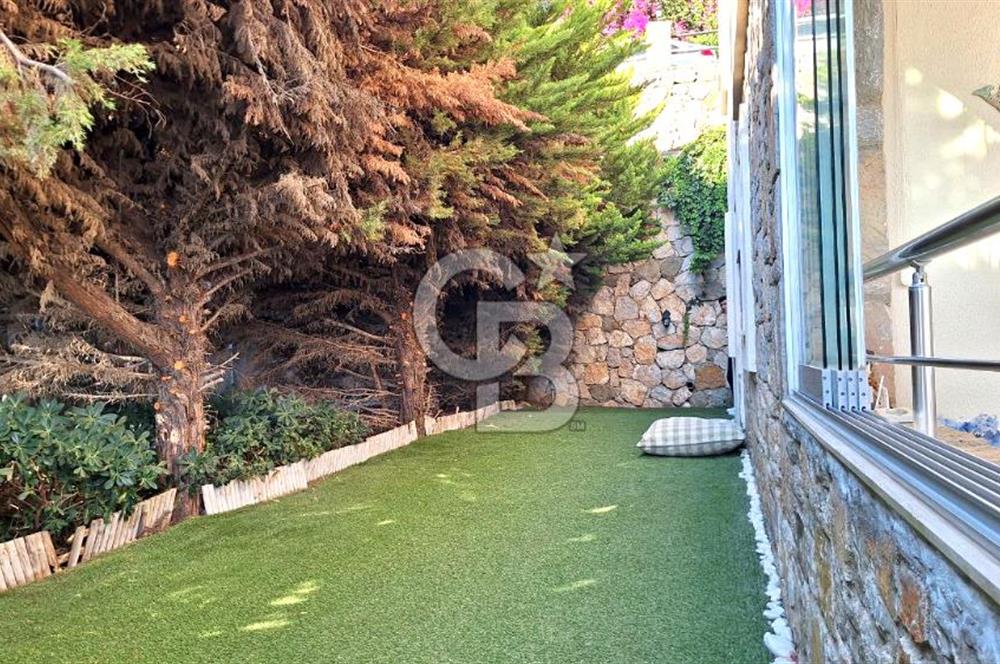 Gümüşlük Koyunbaba’da Deniz Manzaralı Bahçe Katı; Satılık Daire