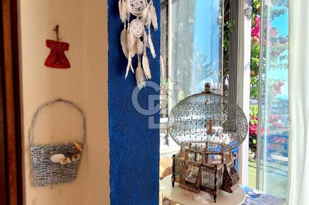 Gümüşlük Koyunbaba’da Deniz Manzaralı Bahçe Katı; Satılık Daire