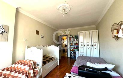MAHMUTBEY MEYDAN'DA MERKEZİ KONUMDA 2+1 SATILIK DAİRE