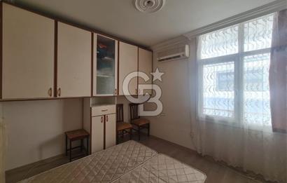 Karşıyaka Banka Sokağında 2+1 Satılık asansörlü ara kat daire