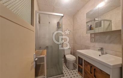 Karşıyaka Banka Sokağında 2+1 Satılık asansörlü ara kat daire